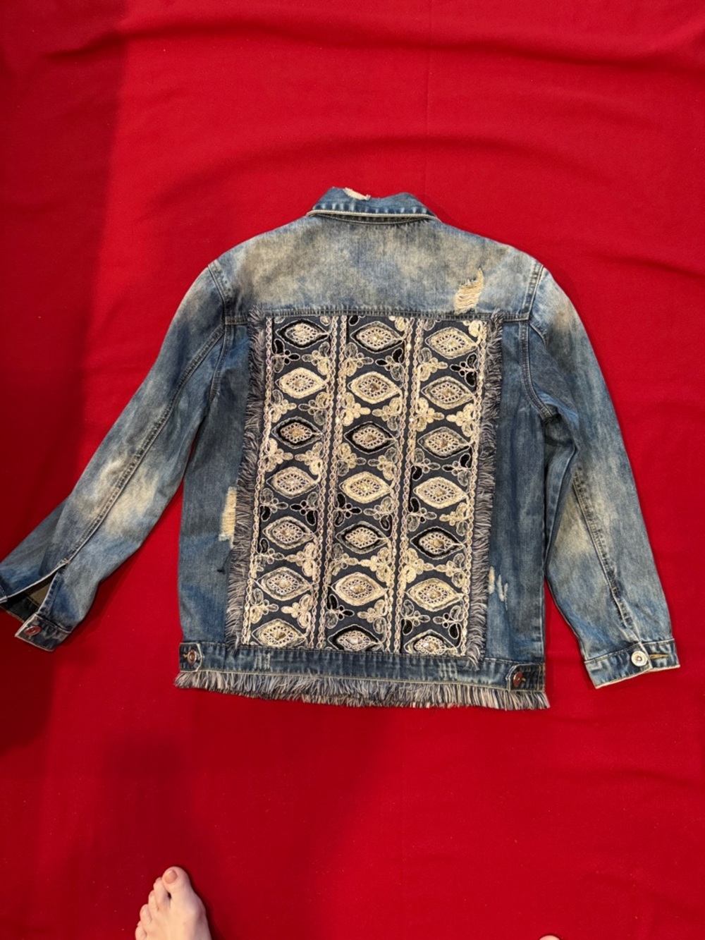 Jaase woman’s Distressed Denim Jacket - Blue with hand embroidery on back
